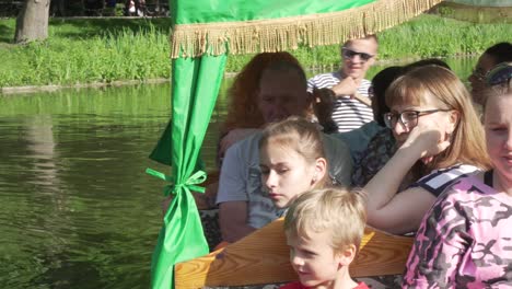 Gondola-boat-full-of-tourists-in-Lazienki-Park-in-Warsaw