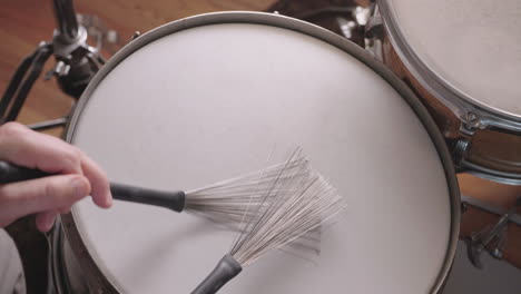 Jazz-Drummer-Plays-Snare-Drum-With-Brushes,-Overhead-In-Slow-Motion
