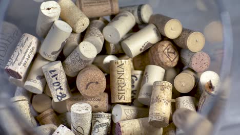 SLOMO:-corks-droping-in-a-glass-container