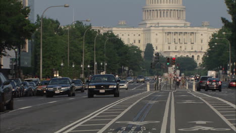 Tilt-From-Traffic-To-U.S.-Capitol,-Washington,-D.C