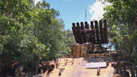 Timelapse-of-an-Old-Tank-With-Rocket-Launcher-Rusting-in-the-Jungle