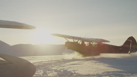 Airplane-in-deep-snow-taking-off