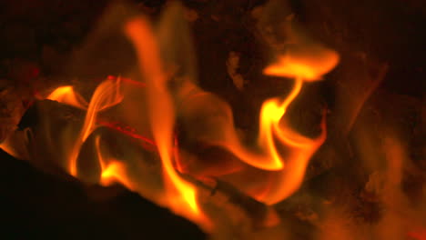 Slow-motion-close-up,-flames-blazing-in-a-hot-fire