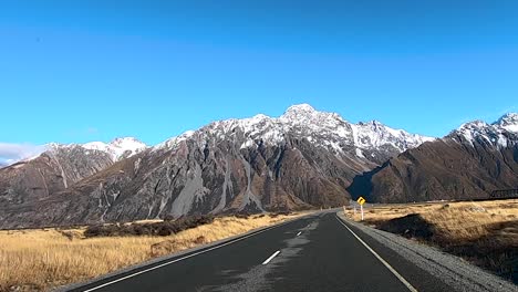 Driving-through-Mt-Cook-National-Park-in-New-Zealand-around-the-winter-period