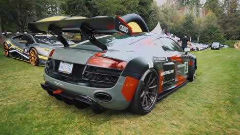 Audi-R8-Driving-Away-on-the-Grass-at-a-Luxury-Car-Show