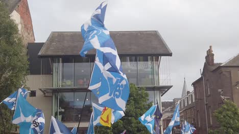 Slow-motion-close-up-of-flags-outside-the-Perth-Concert-Hall-where-the-Tory-Leadership-Hustings-is-being-held