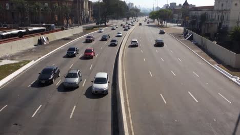 high-angle-of-vehicle-traffic-on-Tiradentes-avenue-in-Sao-Paulo,-Brazil