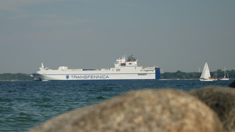 Wide-shot-showing-driving-Transfennica-Ferry-shipping-from-Luebeck-to-Gdynia,Poland