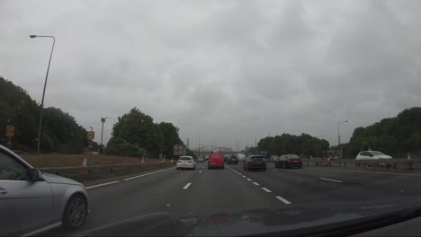 Passenger-POV-In-Car-Travelling-On-M24-Motorway-With-Windscreen-Wipers-On