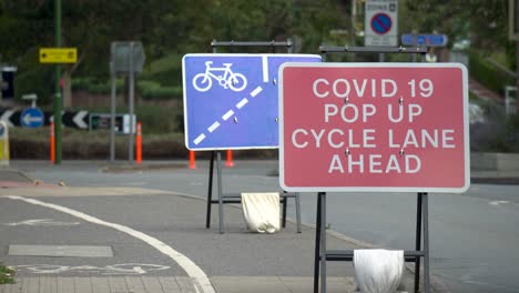 Covid-19-pop-up-cycle-lane-signs-on-road-,-space-to-breathe-road-space