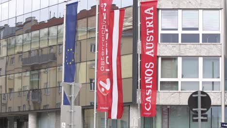 Casinos-Austria-headquater-flags-with-logo-SLOWMO