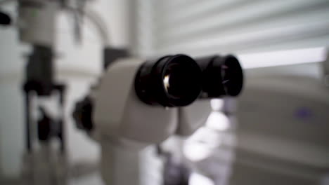 Close-up-of-slit-lamp-ocular-in-optometrist-office---shallow-depth-of-field