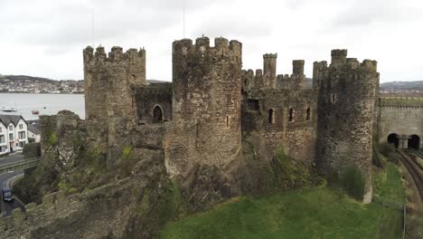 Historical-medieval-Conwy-castle-landmark-aerial-view-mid-orbit-left