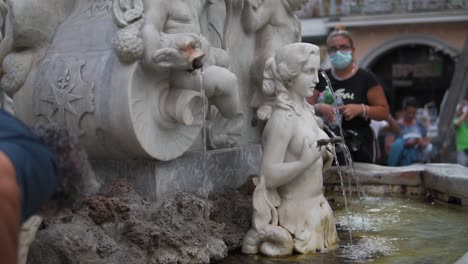 Nude-woman-statue,-sensual-sculpture,-Saint-Andrew-fountain-detail,-Amalfi