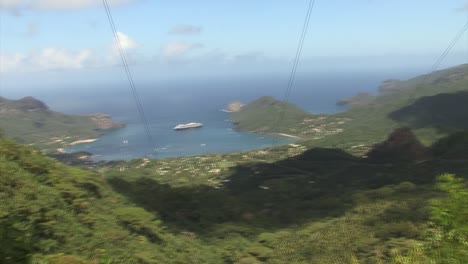 Tourists-taking-photos-and-admiring-the-view-of-Taiohae-bay-from-Hatiheu-lookout-point,-Nuku-Hiva,-Marquesas-Islands,-French-Polynesia