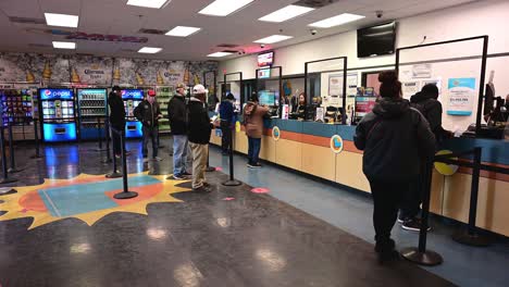 People-waiting-in-line-to-buy-lottery-tickets
