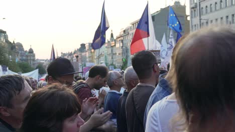 People-clapping-during-demonstration-against-czech-president-and-premier,-Prague,-Czech-Republic