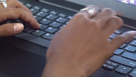 Shot-of-Female-Hands-Typing-on-a-Laptop-Computer