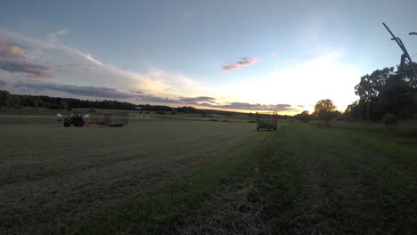 Sun-setting-over-a-quiet-field-in-the-summer-in-Sweden