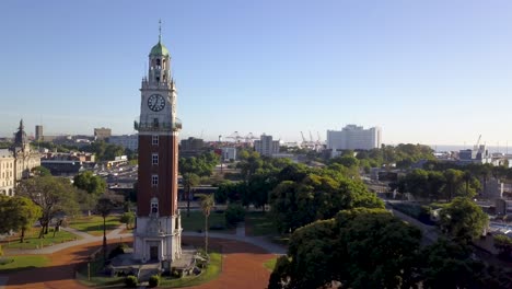 Aerial-view-of-Torre-Monumental-in-Retiro-neighborhood-with-Rio-de-la-Plata-in-background