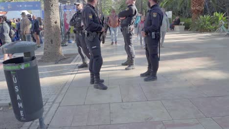 Bearded-prevention-and-reaction-unit-guys-during-Malaga-marathon,-closing-in-shot