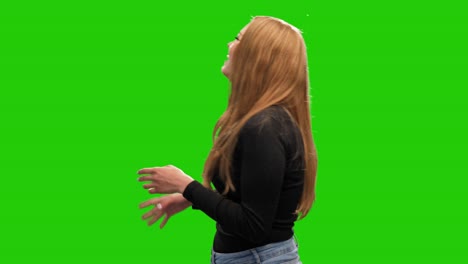 Cute-long-haired-blonde-woman-laughing-on-green-screen