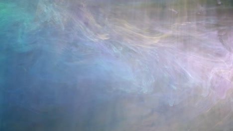 Water-color-acrylic-ink-creating-otherworldly-effects,-beautiful-multi-colored-swirls-almost-look-like-distant-space-nebula's-with-soft-pastel-hues-of-green,-magenta-and-blue