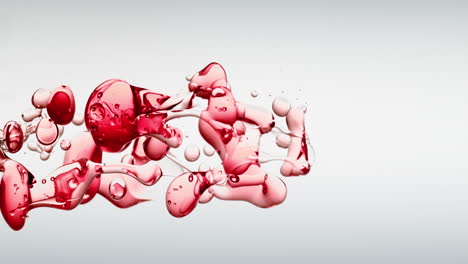 Transparente-Rote-Ölblasen-Und-Flüssige-Formen-In-Gereinigtem-Wasser-Auf-Weißem-Hintergrund-Mit-Farbverlauf