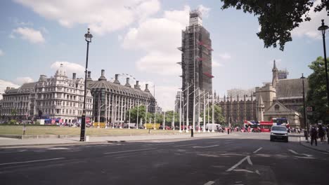 Big-Ben-reconstruction-view-from-Parliament-Square-street-in-London,-sunny-day-wide-angle-view