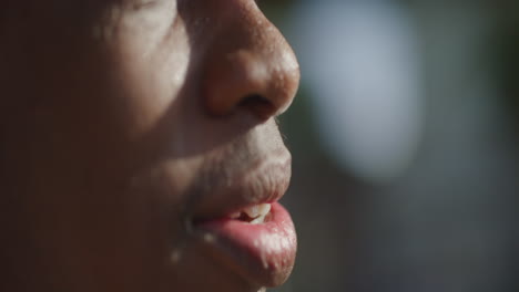 Young-African-American-Male-Lips-Close-Up,-Smiling-and-Talking-Outside