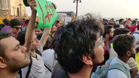 Protesters-wave-signs-and-chant-at-a-demonstration-in-India