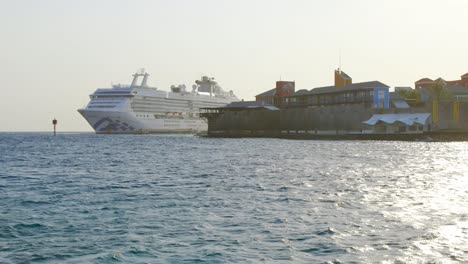Coral-Princess-Cruise-Ship-Docked-At-The-Pier-Of-Curacao-With-Passengers-Under-Quarantine-During-Coronavirus-Lockdown---midshot