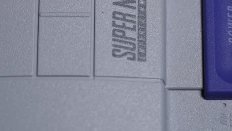 Closeup-Super-Nintendo-Gaming-Platform,-Console-And-Controller