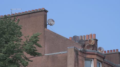 An-ultra-close-up-shot-of-a-tv-aerial-on-a-tenement-roof