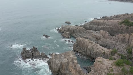 Tojinbo-Cliffs,-Fukui-Prefecture-Japan.-Aerial-Flyover