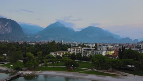 Aerial-view-of-Riva-del-Garda-city,-overview-at-sunrise