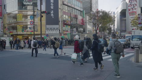 People-On-Both-Ends-Of-The-Lane-Walking-Across-The-Shibuya-Crossing-During-Corona-Virus-Pandemic-In-Tokyo,-Japan