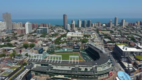 Drone-Flies-Away-From-Wrigley-Field,-Home-of-the-Chicago-Cubs