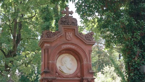 Ornate-gravestone-at-Christian-graveyard-in-Munich