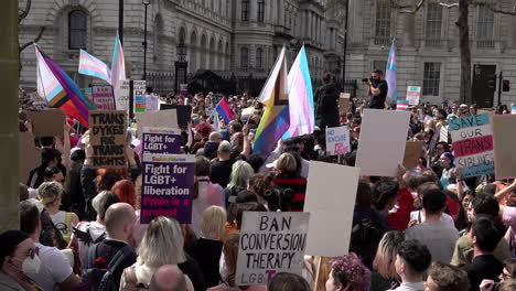 Hundreds-of-people-with-various-placards-gather-opposite-Downing-Street-on-Whitehall-on-a-Trans-rights-protest-opposing-conversion-therapy