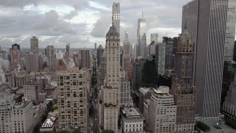 Aerial-view-of-tall-buildings-in-Midtown-east-in-cloudy-Manhattan,-New-York,-USA