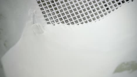 Closeup-Of-Plastic-Manufacturing-Process,-White-Thermoplastic-Material