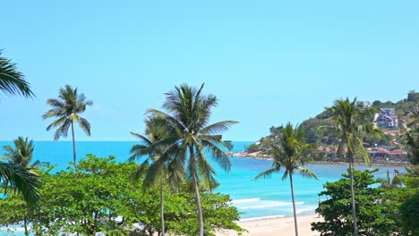 Tropical-Island-on-Hot-Sunny-Day,-White-Sand-Beach,-Green-Trees-and-Blue-Horizon