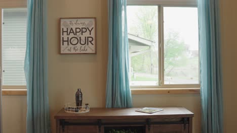its-always-happy-hour-at-the-lake-wooden-sign-at-a-cabin-in-minnesota