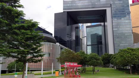 Tamar-Park-in-Hong-Kong,-HKSAR-Government-Headquarter-buildings-in-background