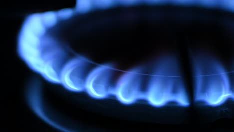 Gas-blue-flame.-Gas-stove-on-black-background