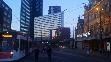 View-of-the-Railway-Station-Den-Haag-HS-with-public-transport-and-commuters-walking-by