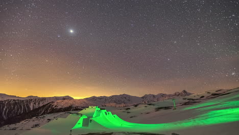 Stars-and-planets-cross-the-sky-above-the-Suzuki-Nine-Knights-stunt-obstacles-in-South-Tyrol,-Italy-in-the-stunning-time-lapse