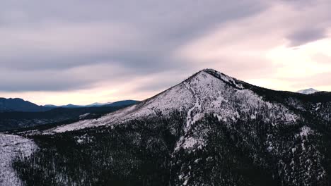 Snowy-Mountain-Peak-Sunset-Aerial-Drone-Footage-Pan