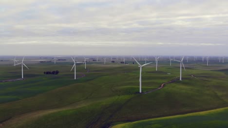 drone-shot-of-windmills-in-a-field